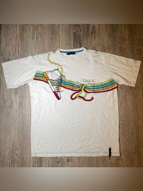 This vintage COOGI embroidered sneaker
Used